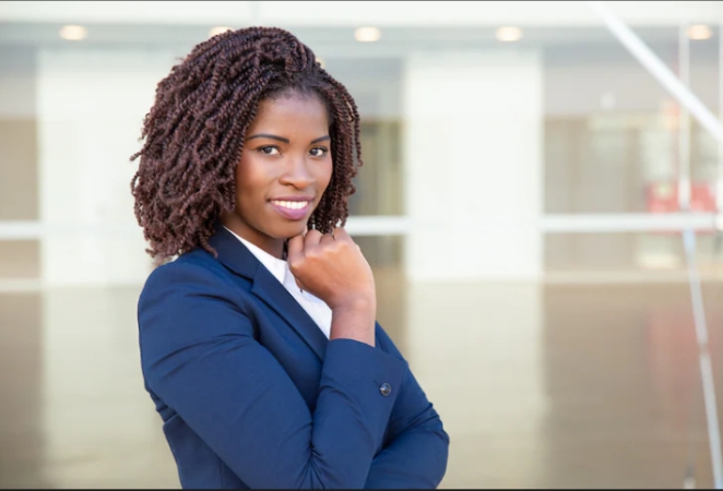 A lady smiling with a call to action in foreground